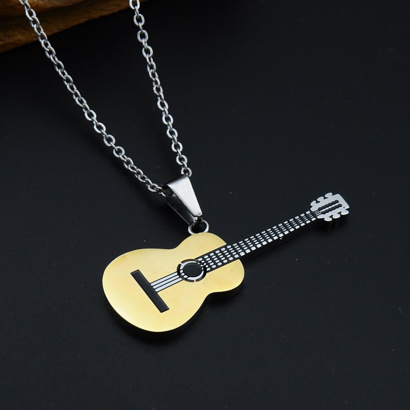 Guitar-shaped pendant necklace on a black background