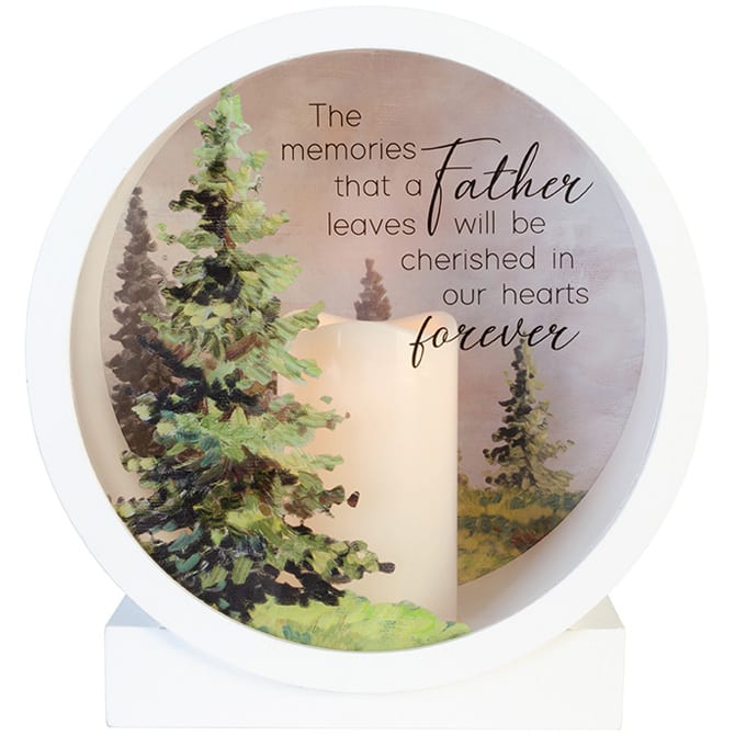 Memorial candle with a father remembrance message and forest scene