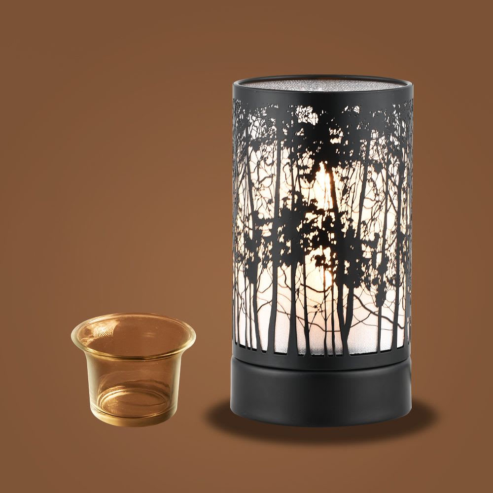 Black tree-pattern candle warmer with a small glass cup