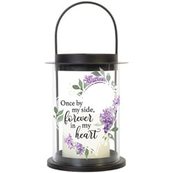 Black lantern with a memorial quote and purple floral design