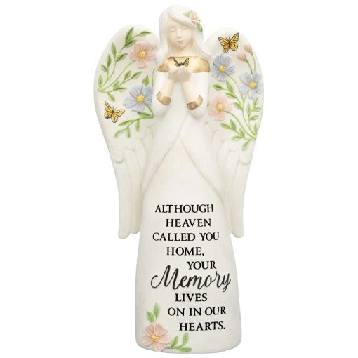 Angel figurine with floral accents and memorial text