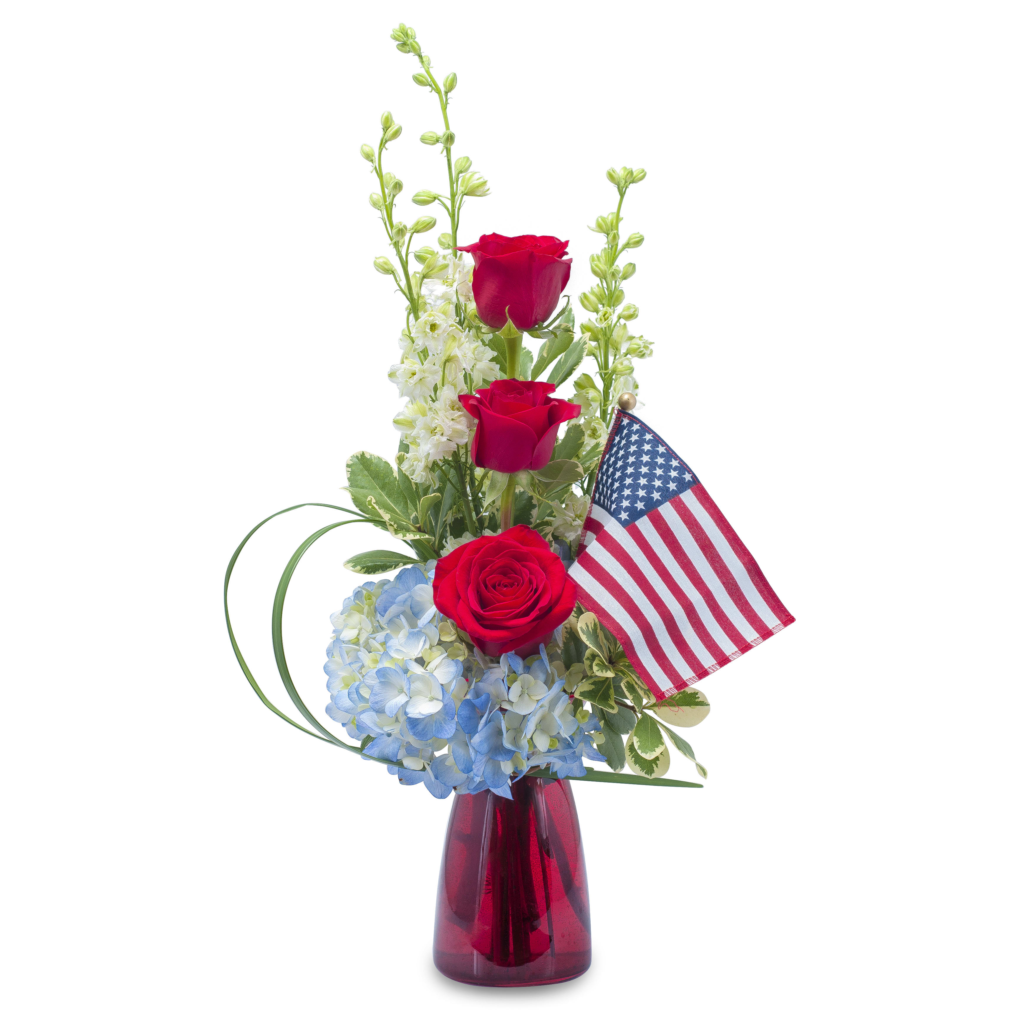 Red roses and blue hydrangeas in a red vase with a small American flag