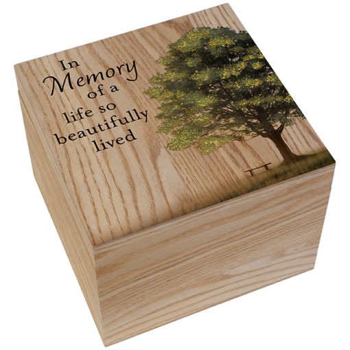 Wooden memorial box with a tree and remembrance text