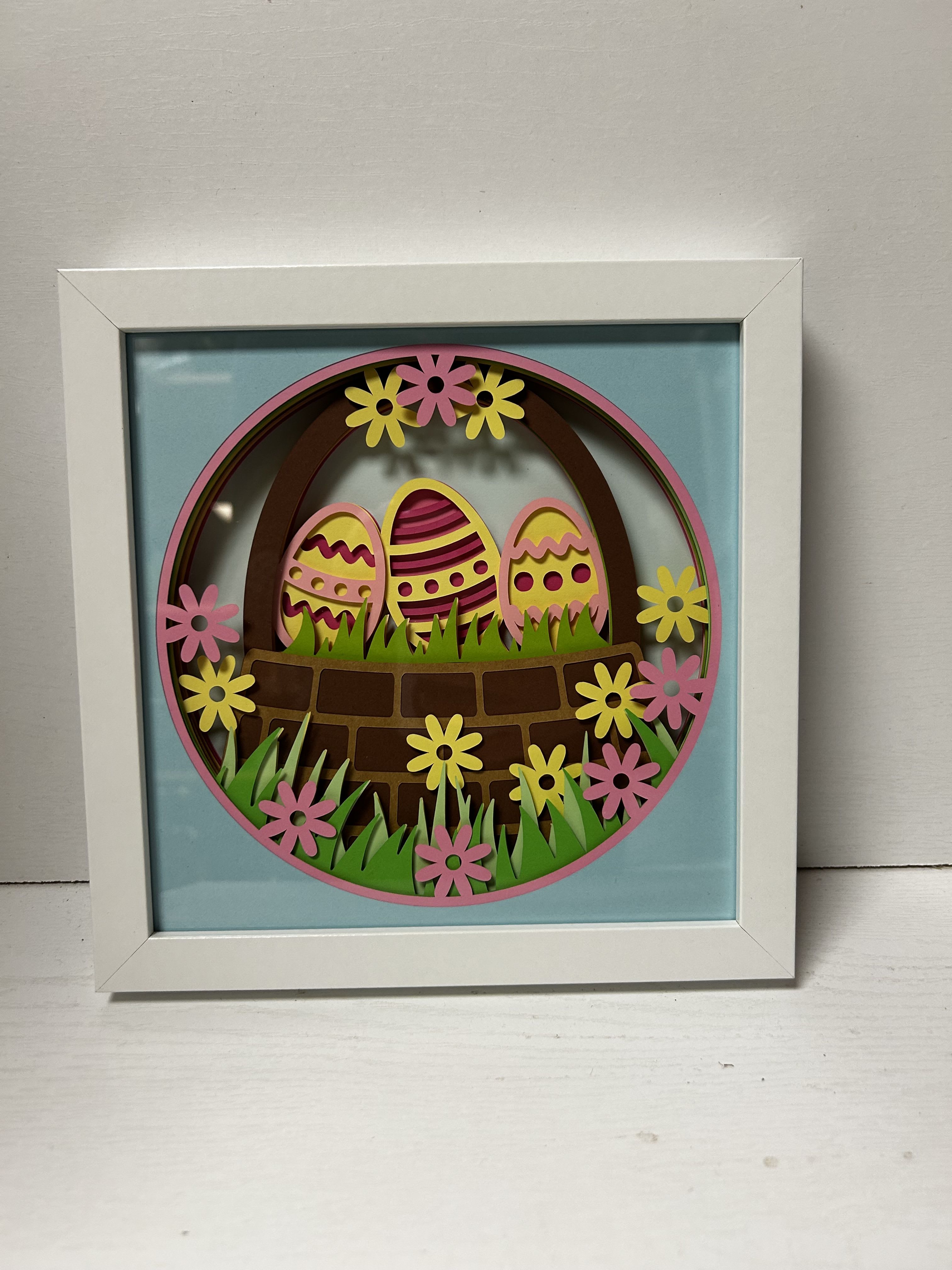 Framed Easter egg paper art with flowers and grass