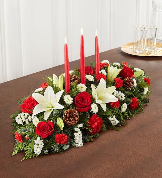 Traditional Christmas Centerpice - centerpiece with xmas greens seasonal flowers shown is premium