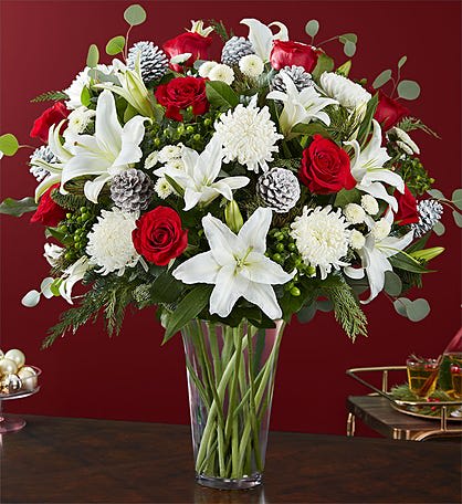 Garden of Grandeur Holiday - Lilies mums roses carnations pine, pine cones fresh xmas greens