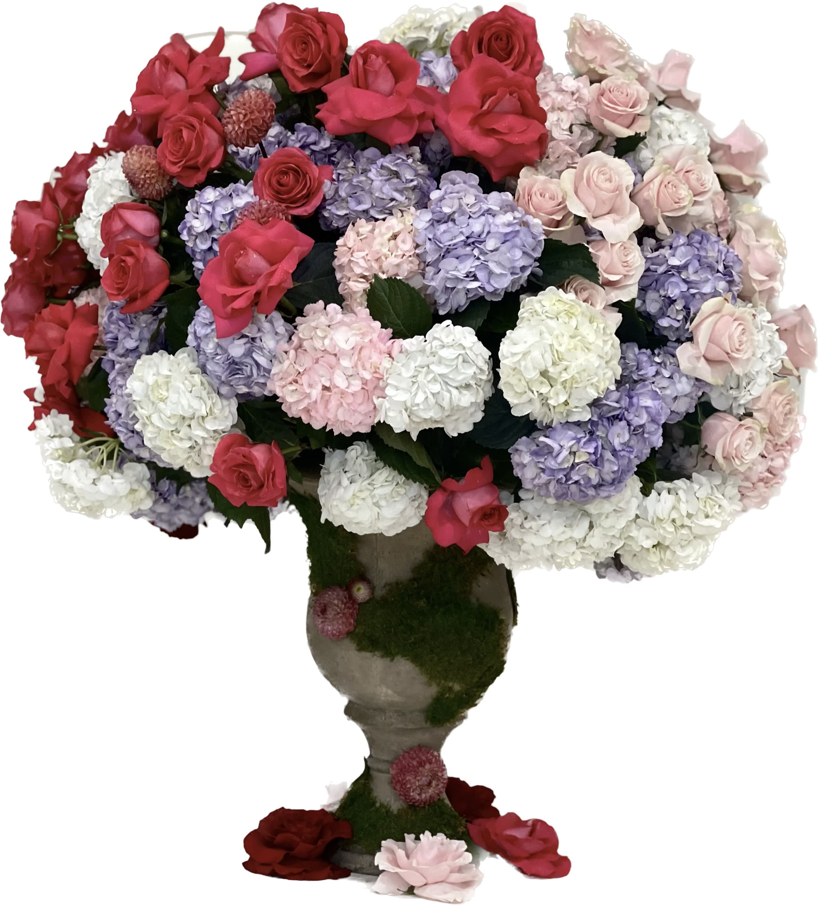 Large bouquet of roses and hydrangeas in a pedestal vase