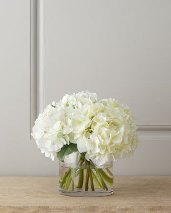 White hydrangea bouquet in a clear glass vase