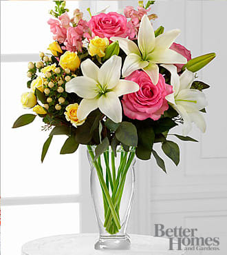 The Blooming Rose &amp; Lily Bouquet  - This bouquet includes: pink roses, cream spray roses, white Asiatic Lilies, pink snapdragons, peach hypericum berries and seeded eucalyptus. ( vase will be chosen by the designer)