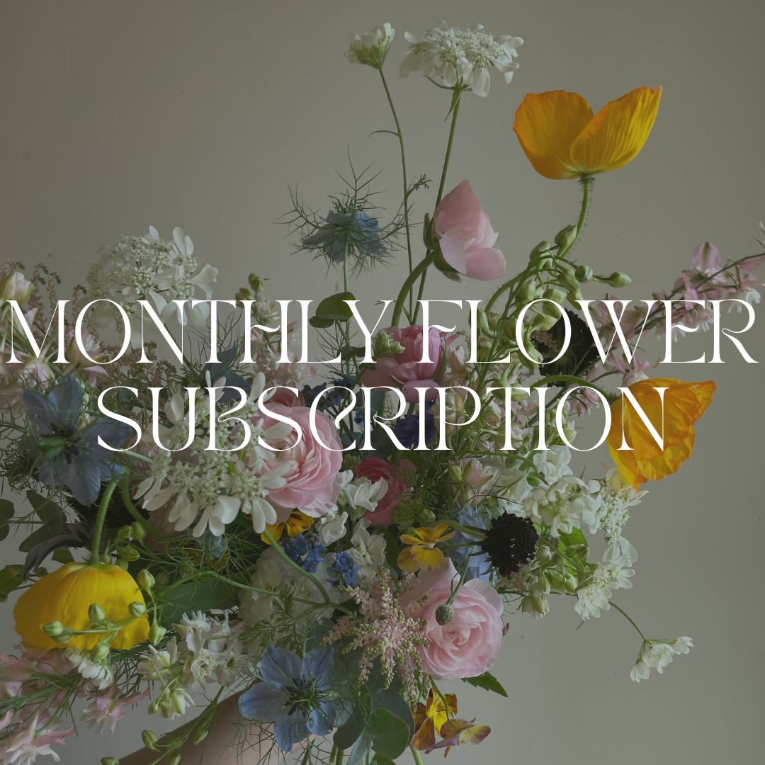 Mixed bouquet with pink, white, yellow, and blue flowers