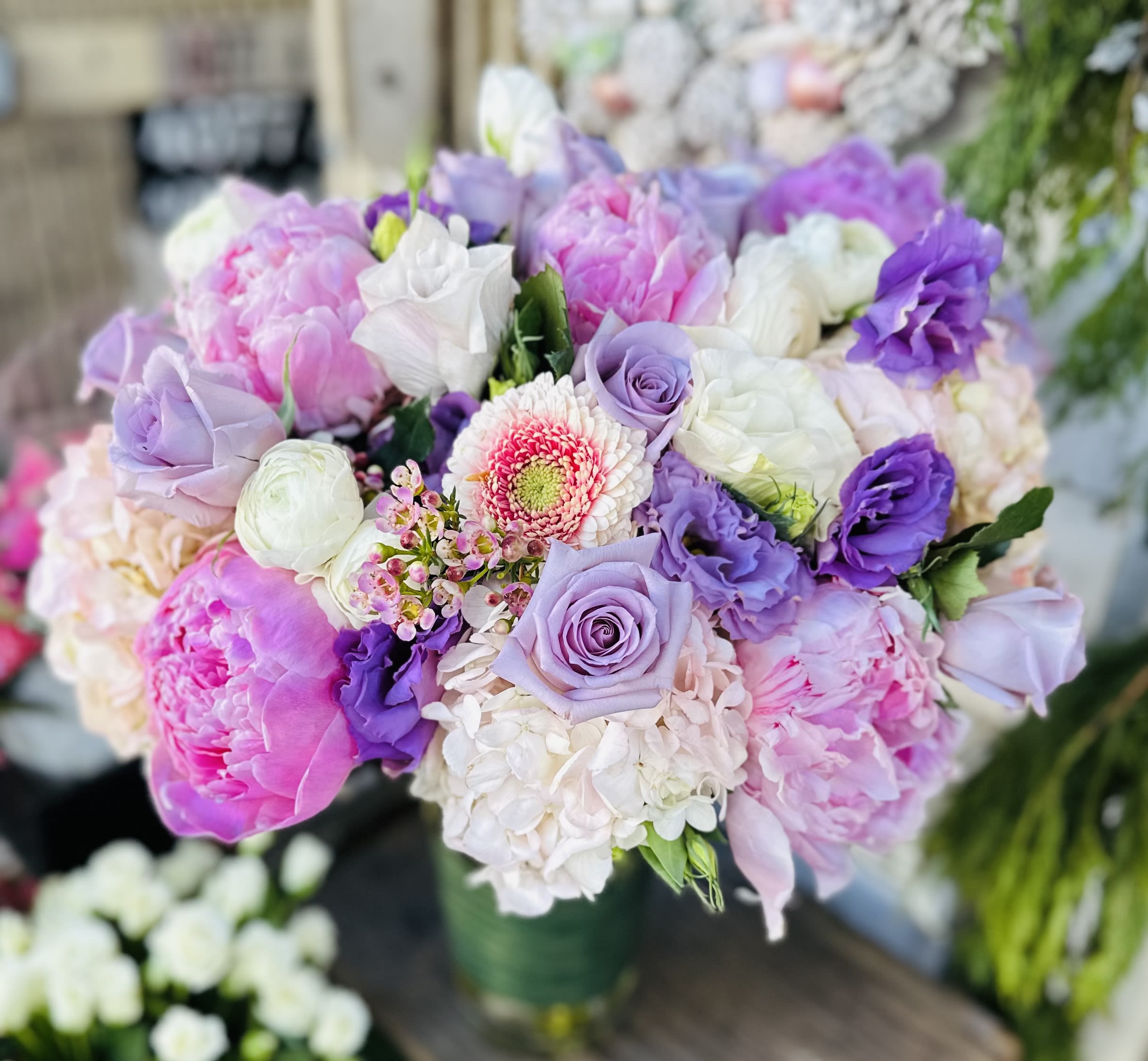 Bouquet of pink, lavender, and white flowers in a vase