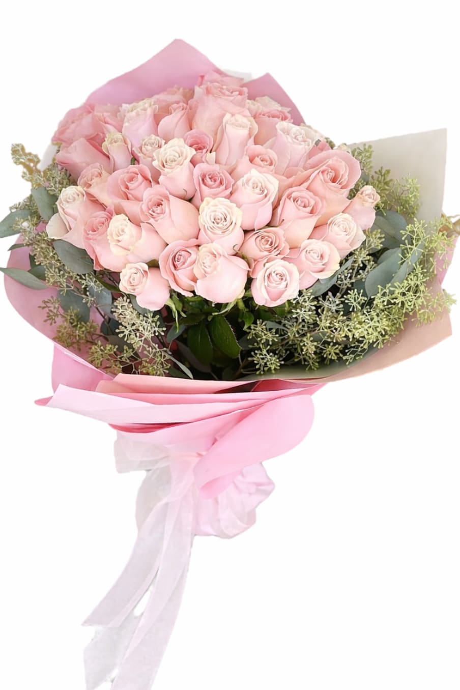 Bouquet of pale pink roses wrapped in pink paper
