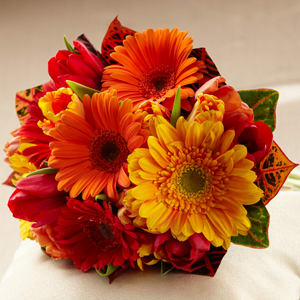Bouquet of orange, yellow, and red gerbera daisies