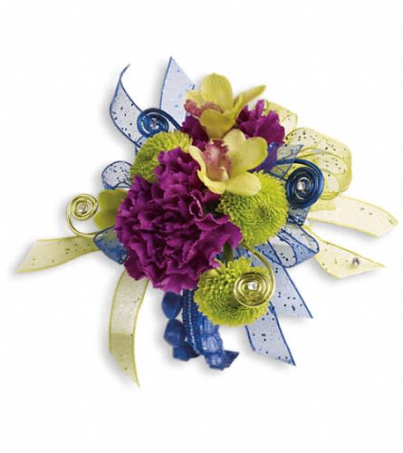Purple and green floral corsage with blue and yellow ribbon accents