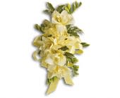 Yellow-white floral corsage with green accents