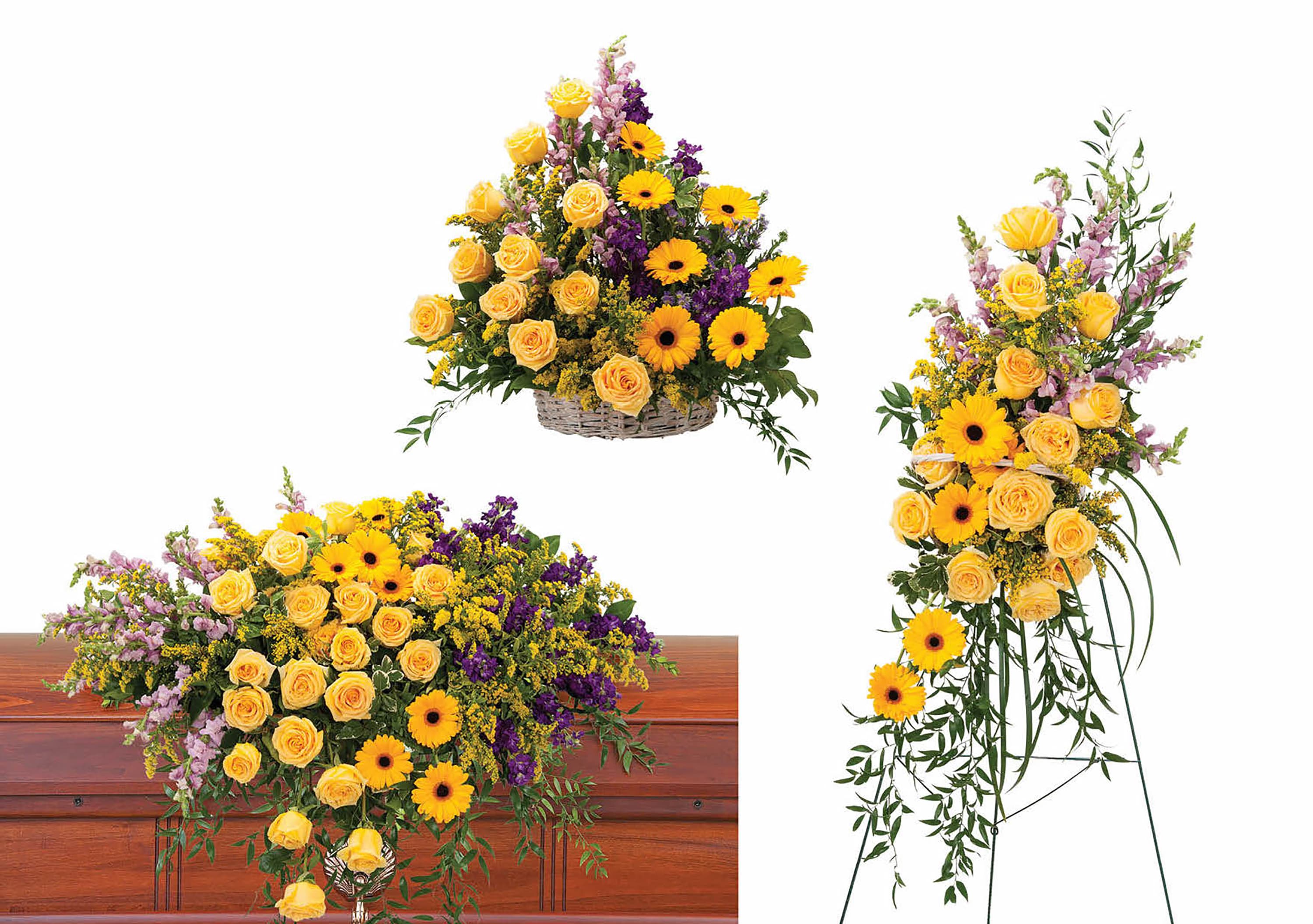 Yellow roses and daisies arranged in a casket spray and standing spray.