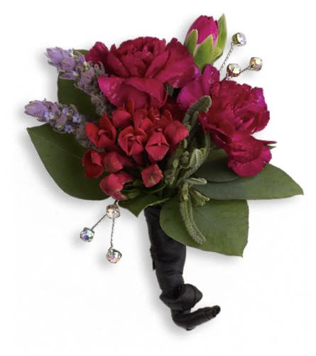 Small bouquet of magenta flowers with green leaves and jeweled accents