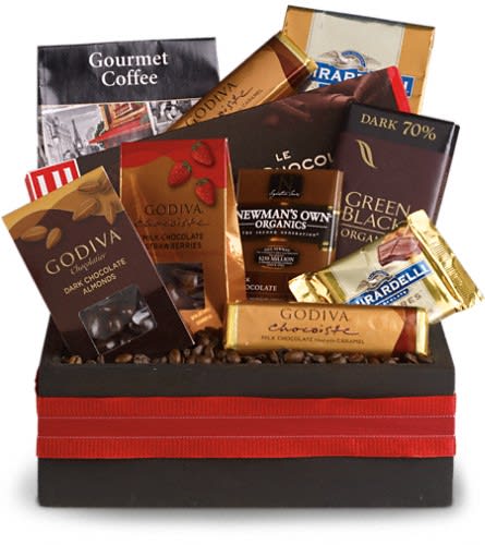 Assorted chocolate bars arranged in a gift box with a red ribbon