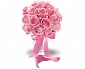 Pink Sorbet Bouquet - Pink-redible! This glamorous girly bouquet of pink roses is dressed up with corsage pins and wrapped with pink satin ribbon. A generous array of pink roses wrapped with pink satin ribbon.Approximately 11 1/2" W x 13 1/2" H Orientation: N/A As Shown : T194-1A