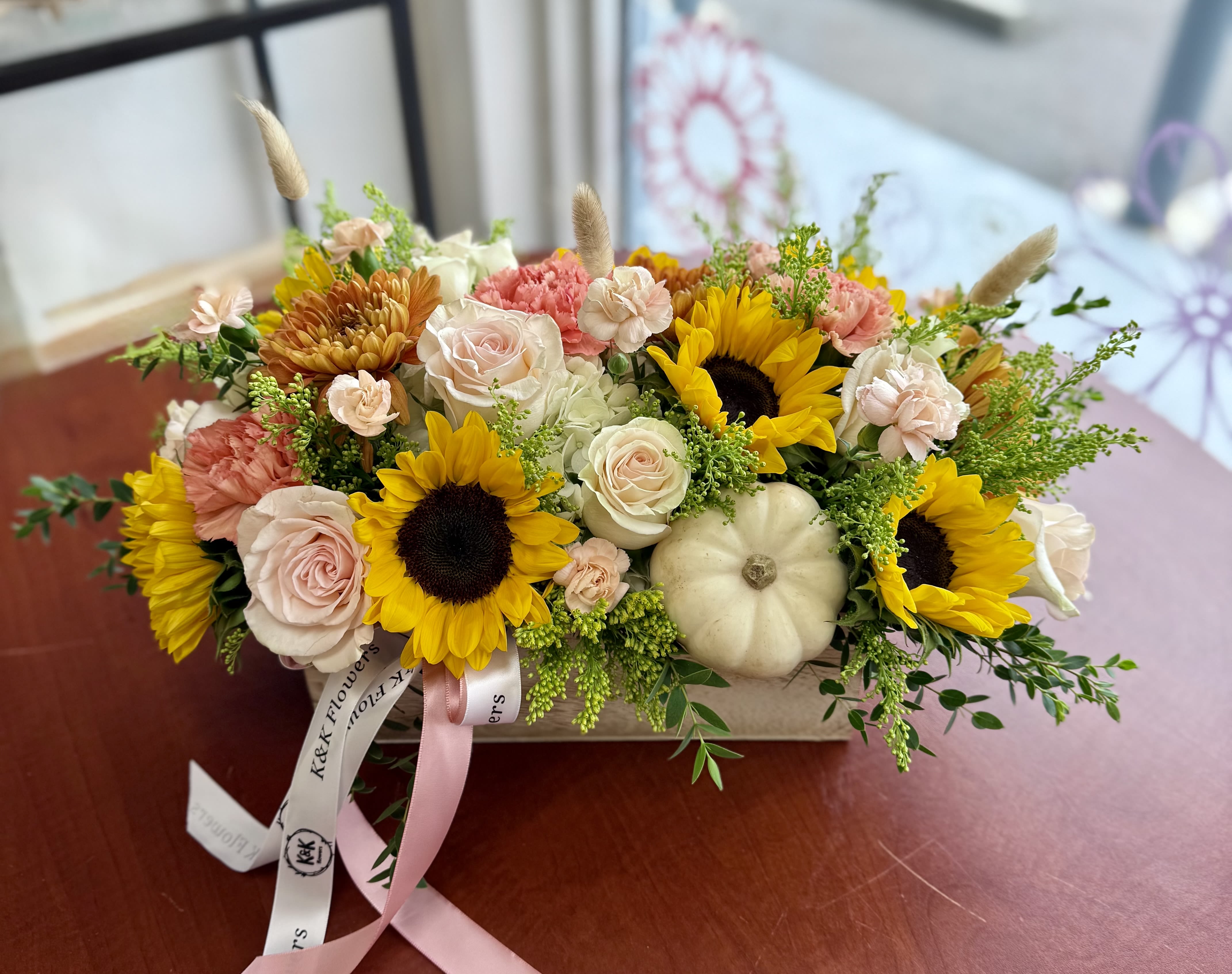 "Soft Fall" Long wood box arrangement - If You want bouquet with a twist, choose our flower boxes. We have wood boxes for rustic looking arrangements, or hat boxes for a more elegant look. It’s a beautiful and convenient way. Flowers in boxes don’t need vases. That makes it perfect for transportation and keeping flowers hydrated and secure.