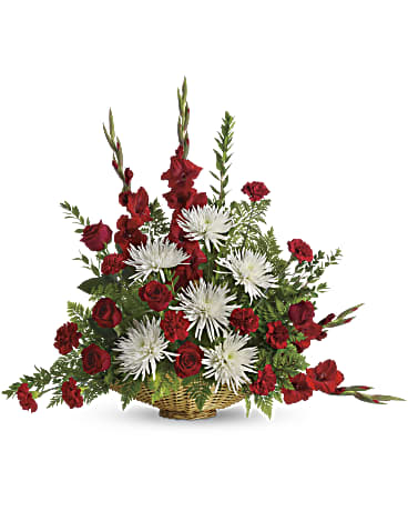 Basket arrangement of red roses and white spider mums