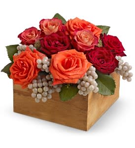 Wine Country - In wine country, wooden cases hold bottles of fragrant wine, lush grapes hang from gnarled vines, and wild roses bloom at every turn. We've captured the essence of this glorious region with a striking arrangement of orange and red roses and green grapes, nestled into a real wooden box.