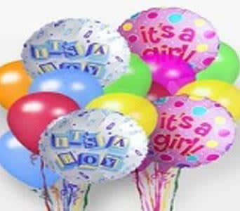 Cluster of colorful birthday balloons with printed messages