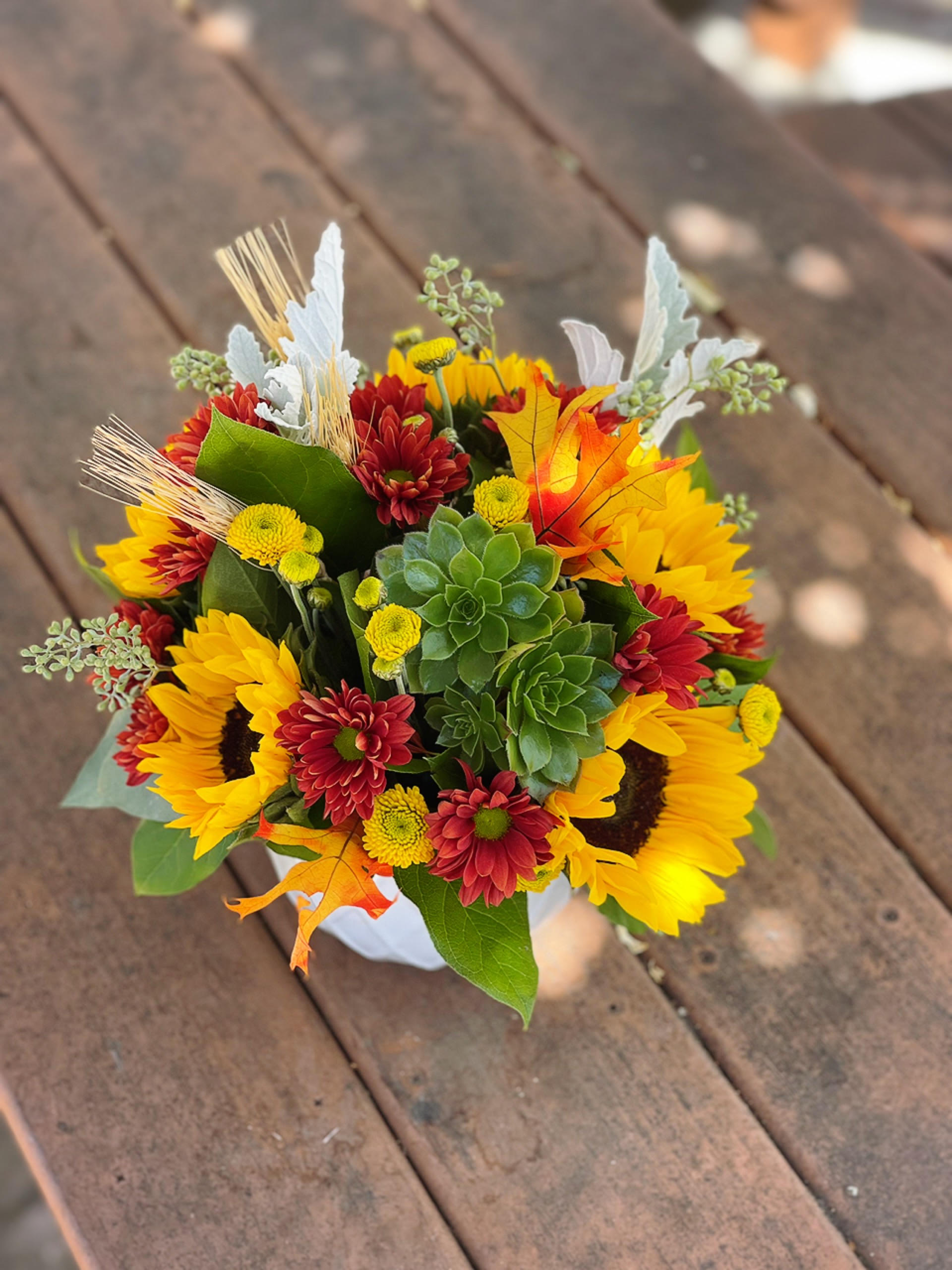 Fall Garden by Bee - - 3 Sunflowers - 1 Succulent  - 2 Stems Red Cushion -Yellow Daisies -Dusty Miller -Fall Leaves -White ceramic container