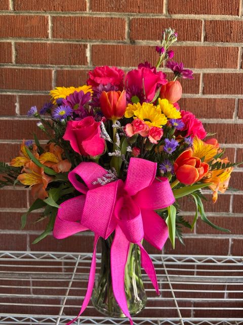 Hot Mama - A fresh floral arrangement of vibrant colors makes this bouquet a Hot Mama! 