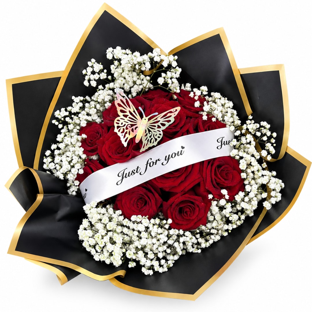 Red rose bouquet with white baby's breath and a butterfly topper