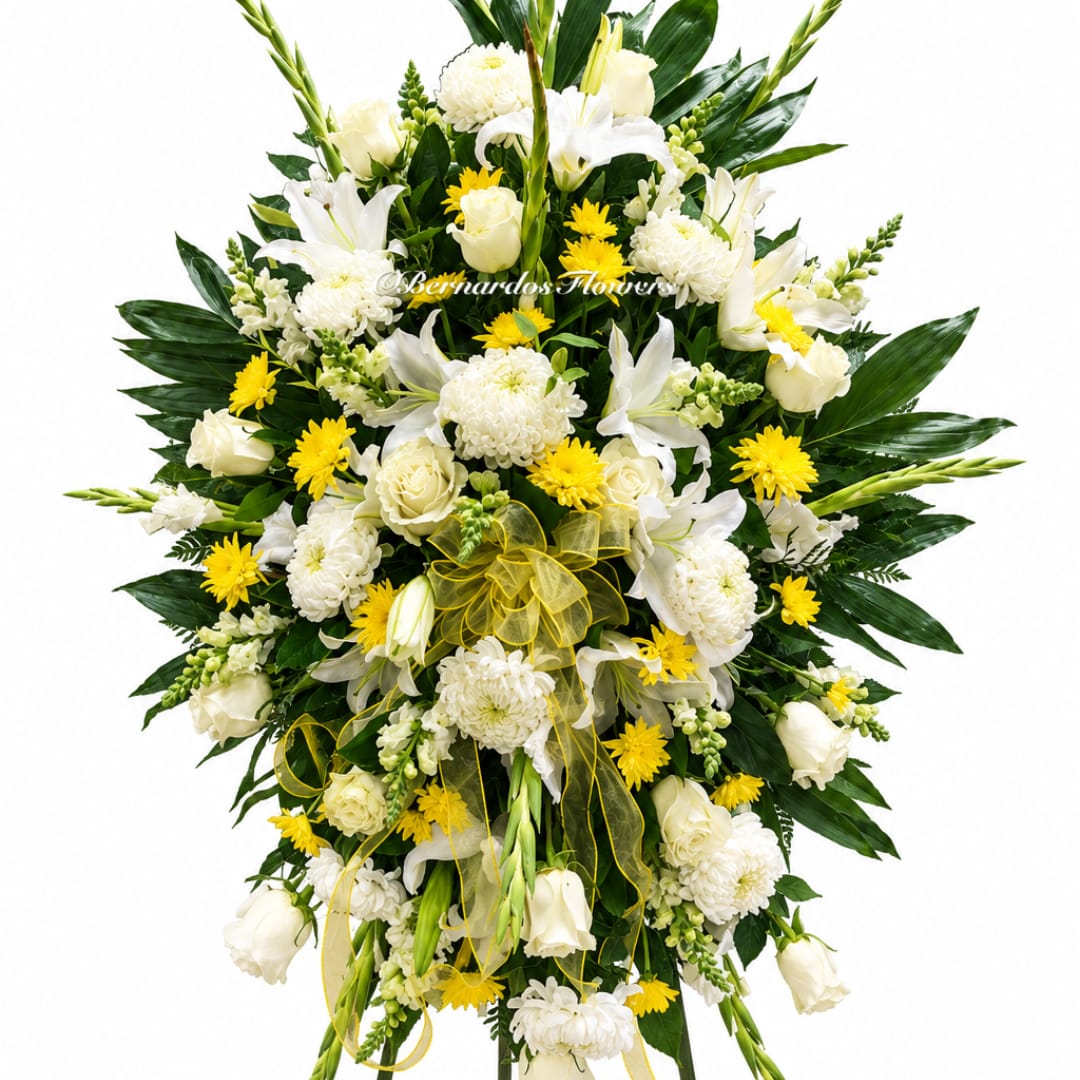 White and yellow floral spray with lilies and roses