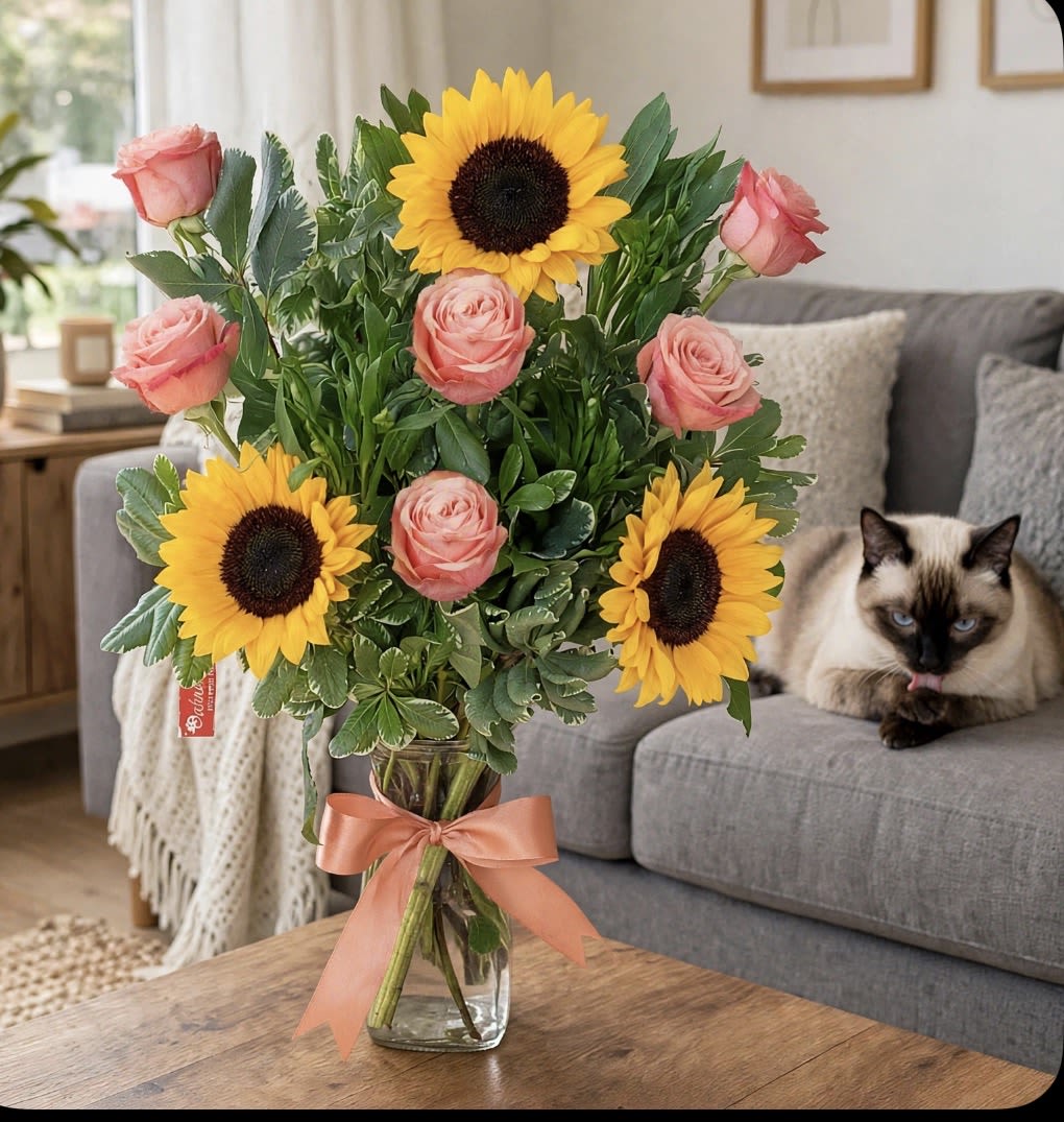 Luxury Kahala Peach Rose &amp; Sunflower Bouquet | Cat Lover’s Collection | Same-Day Orange County Flower Delivery - Celebrate the love of flowers and feline companions with our Kahala Peach Rose &amp; Sunflower Bouquet, a charming and elegant arrangement designed especially for cat lovers. This beautiful bouquet features premium Kahala peach roses paired with bright golden sunflowers, creating a warm, cheerful, and sophisticated floral design full of natural beauty.  The soft peach tones of the Kahala roses blend beautifully with the vibrant yellow sunflowers, creating a perfect balance of elegance and happiness. Handcrafted by the floral designers at Orchids Little Secret Boutique, this unique arrangement is perfect for birthdays, anniversaries, thank-you gifts, congratulations, get-well wishes, or simply surprising someone special.  As part of our exclusive Cat Lover’s Collection, this bouquet is thoughtfully designed for those who adore their cats and appreciate the joy that fresh flowers bring into their home. Each arrangement is created with pet-conscious customers in mind while adding a beautiful touch of color and warmth to any space.