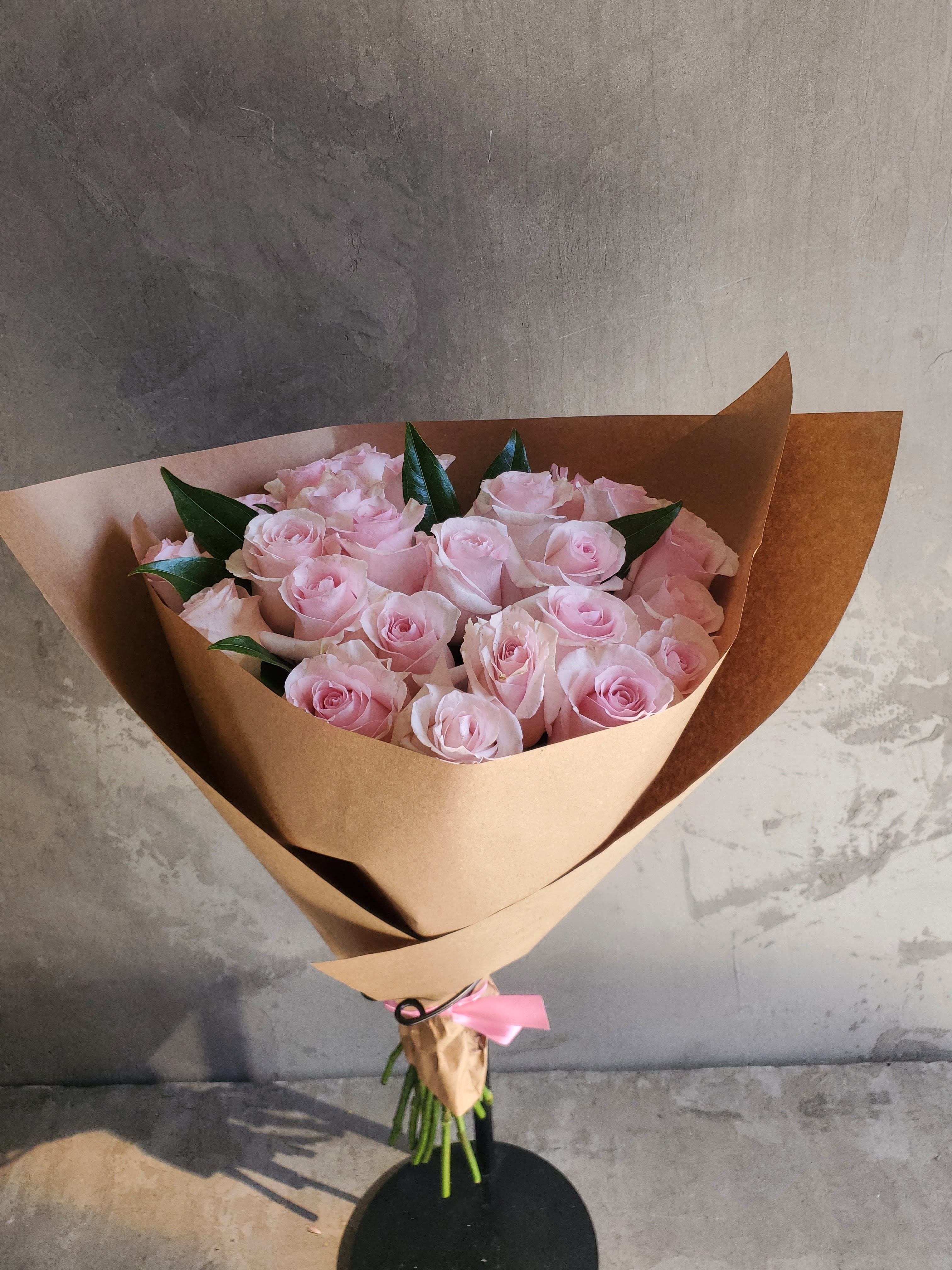 2 Dozen Light Pink Bouquet - A Beautifully wrapped 2 Dozen Light Pink Roses
