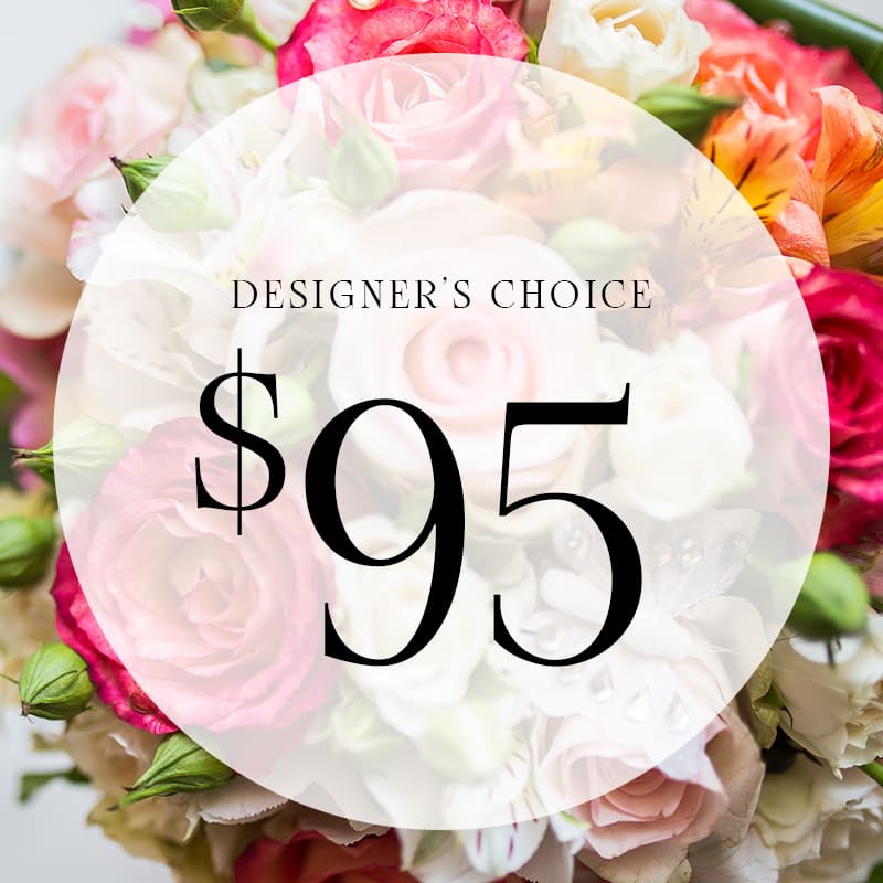 Mixed pink, white, and orange flower bouquet with a $95 designer's choice label