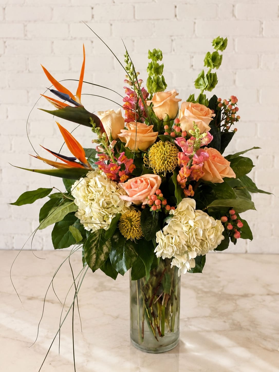 Adventure in the Tropics - Like a tropical island breeze this eye catching arrangement will capture that island feeling.  