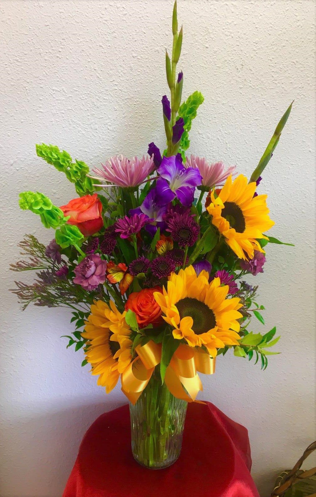 Fall Is Near by Forever Flowers  - Vase arrangement containing sunflowers, glads, roses, etc.. 