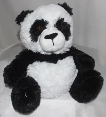 Black-and-white plush panda bear sitting upright