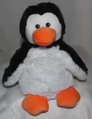 Plush penguin toy with orange beak and feet