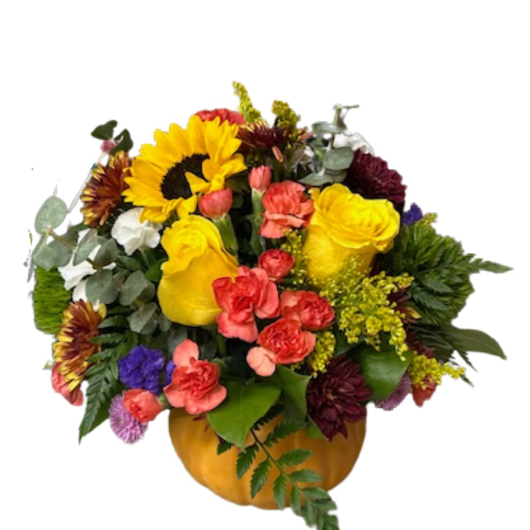 Mixed bouquet with sunflowers, roses, and carnations in a pumpkin container