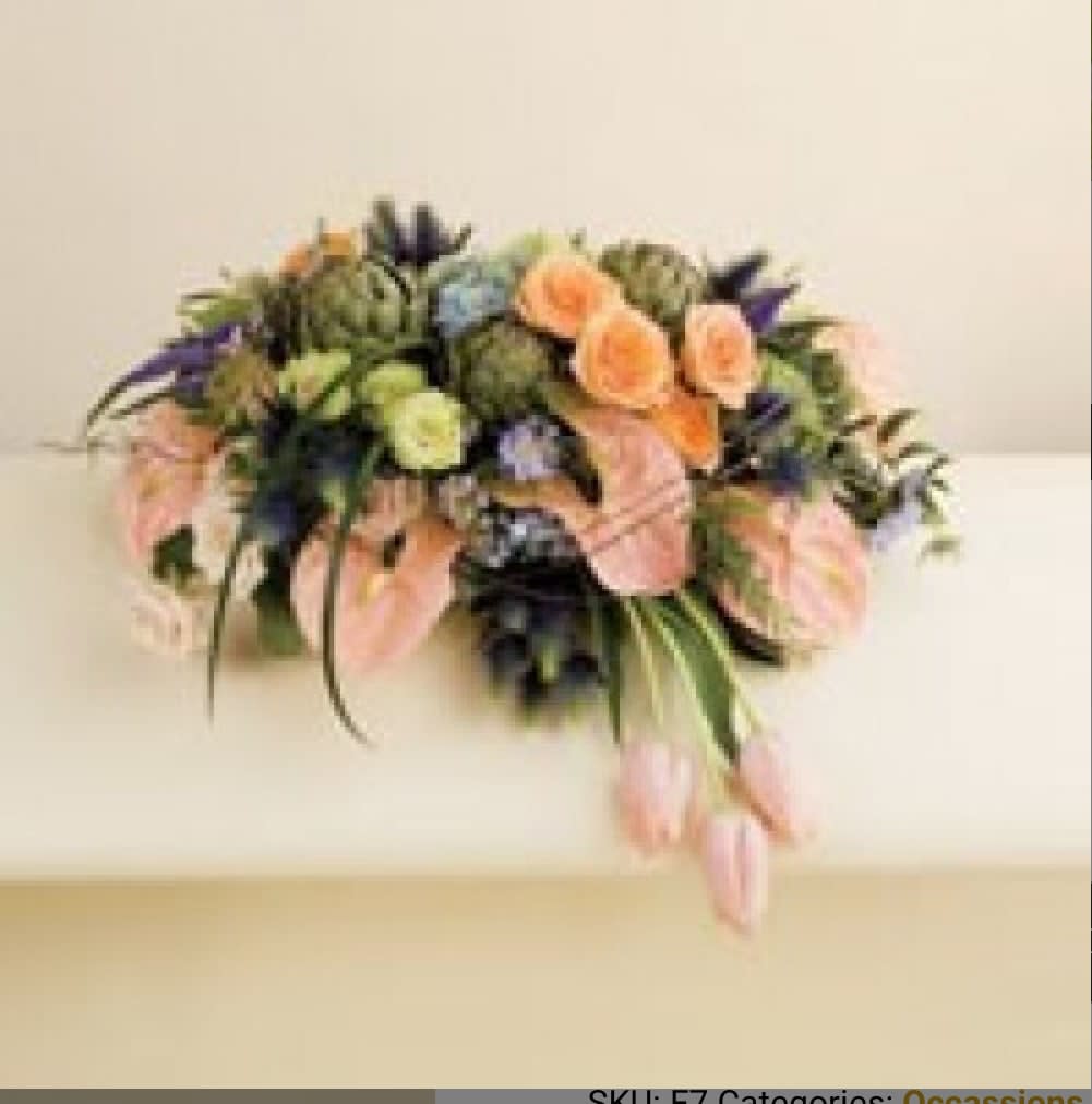 Mixed bouquet with peach, pink, and purple flowers