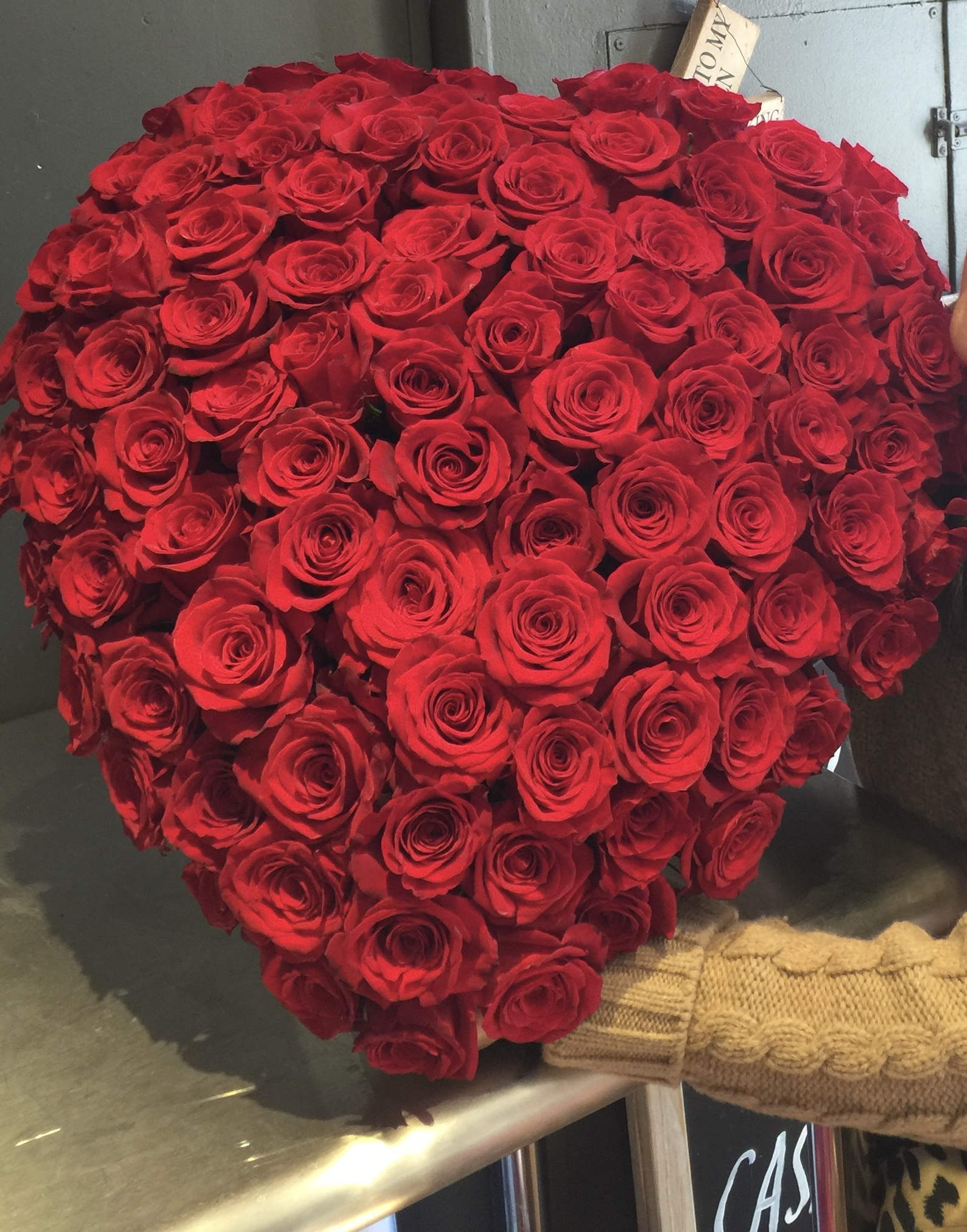 Large heart-shaped bouquet of red roses