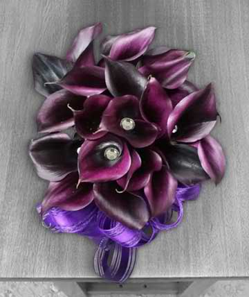 Purple calla lily bouquet with a ribbon wrap
