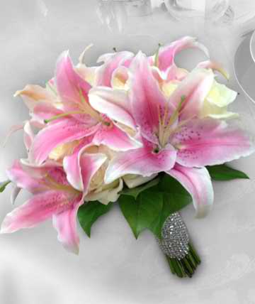 Pink and white lily bouquet with a jeweled handle wrap