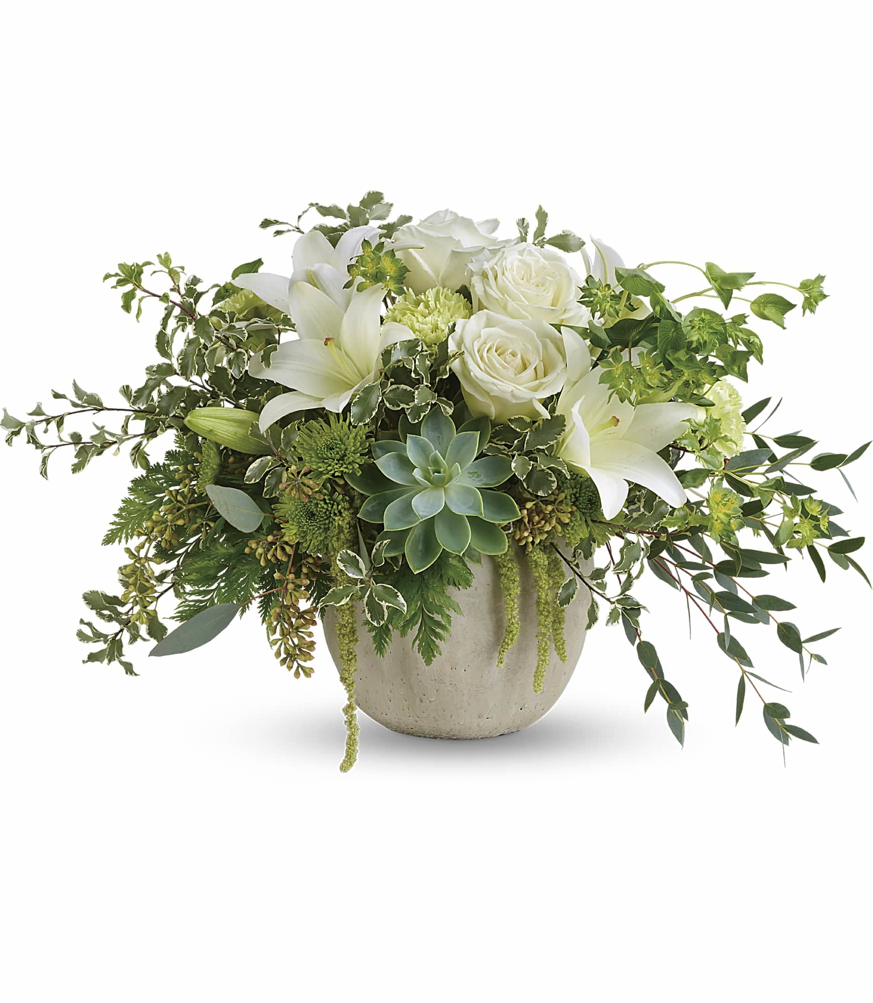 White lilies and roses in a beige vase with trailing greenery