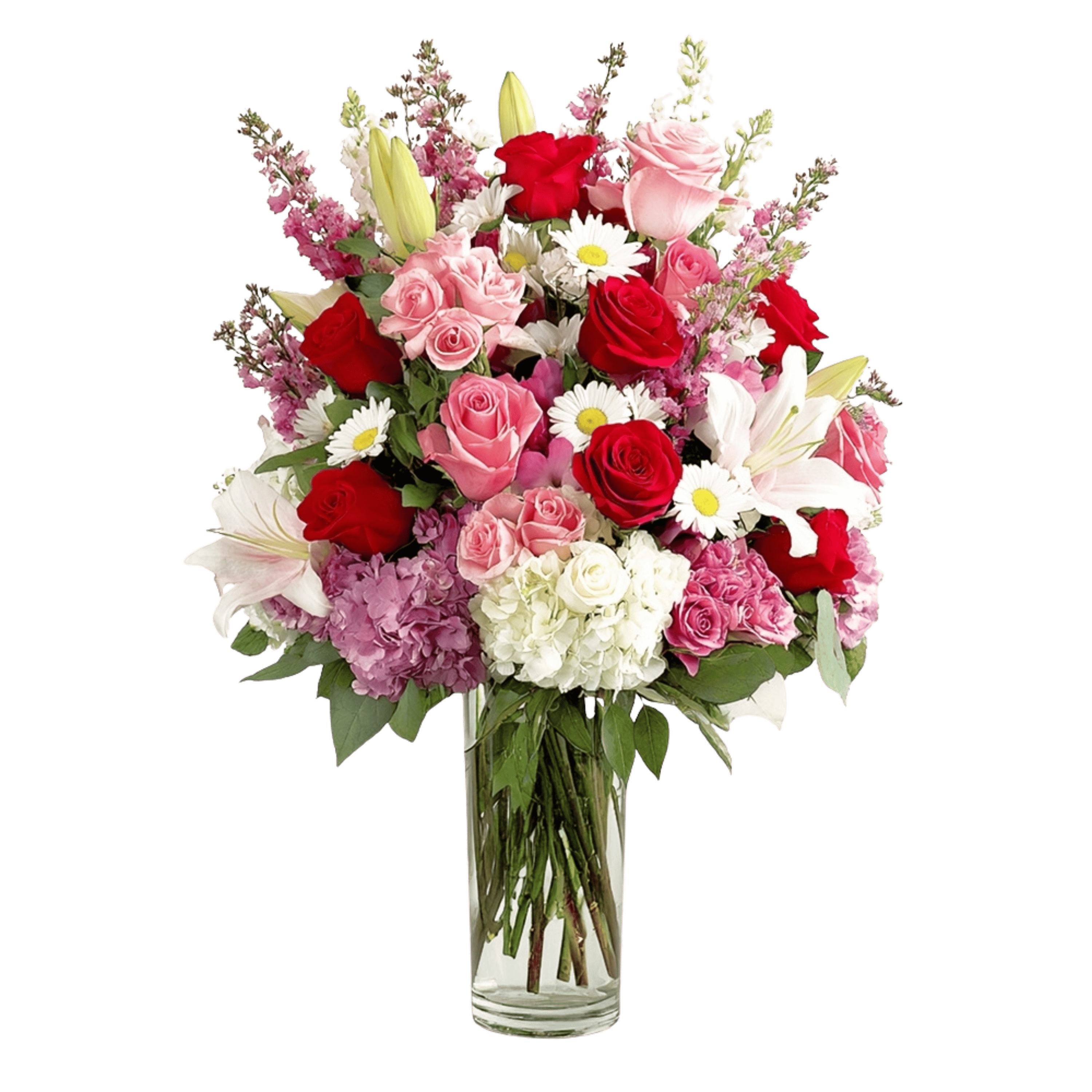 Mixed bouquet of roses, lilies, daisies, and hydrangeas in a clear glass vase