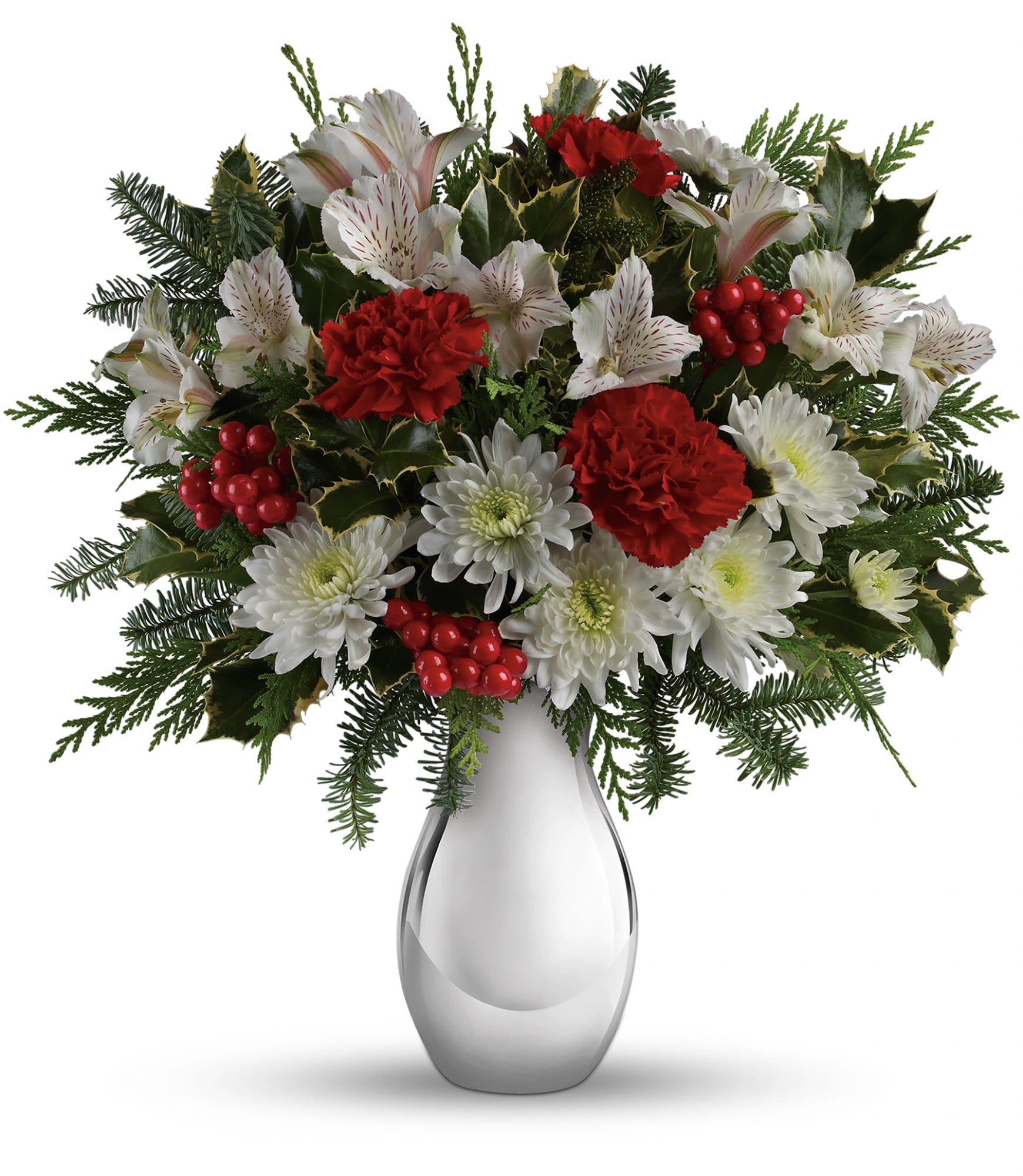 Teleflora's Silver And Snowflakes Bouquet - Red carnations, white alstroemeria and white cushion chrysanthemums are arranged with variegated holly, flat cedar, noble fir and red berries. Delivered in a beautiful Silver Reflections vase. Approximately 16 1/2" W x 17 1/2" H.  TWR08-3A