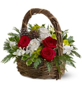 Orchids in Bloom - Dress any home in country-style floral finery with a rustic basket filled with eye-catching white orchids, velvety roses, real pinecones and fresh evergreens, and brighten up the holiday celebration! A charming display, perfect for friends and family.  Red and white roses and white dendrobium orchids – accented with fresh green flowers, evergreens and pinecones – are delivered in a woven handled basket.  Approximately 17" (W) x 14" (H)  Orientation: All-Around  As Shown : TFWEB279