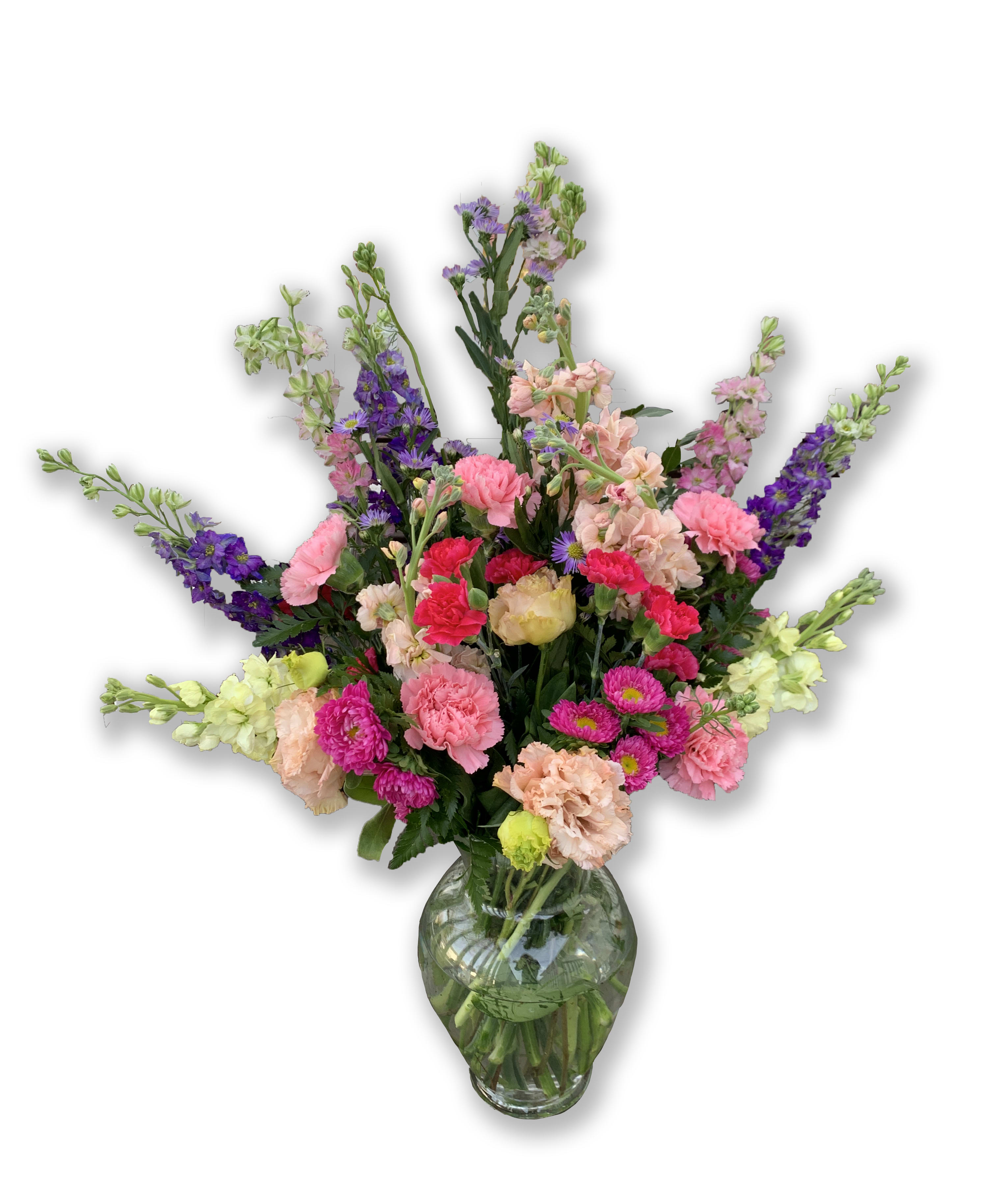 Sunshine And Smiles - Carnations, asters, larkspur and snapdragons arrive in a clear glass vase. Approximately 13" W x 22" H  TF5-2 Premium shown in the image 