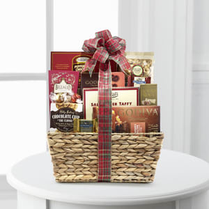 Chocolate Indulgence Basket - Better - More like a chocolate IV! We've taken your favorite chocolate basket and filled it with even more chocolate goodies. From chocolate cookies to chocolate-covered treats the contents of this basket will sure quell any cocoa craving. Gift basket includes: Dolcetto Wafer Rolls 4.4oz Godiva White Chocolate Cookies &amp; Cream Bar 3.5oz Chocolate Creme Puffs .77oz Chocolate Salted Caramel Cookies 2-oz Cherries &amp; Almond in Dark Chocolate Chocolove Mini Bar 1.3oz Chocolate Drizzled Caramel Popcorn 6oz Almond Roca Butter Crunch .77oz Lindt Raspberry Filled Bar 3.5oz Ghirardelli Dark Chocolate Square .375oz Ghirardelli Milk Chocolate with Caramel Square .375oz Hot Cocoa Mix 1.25oz Lindt Milk Chocolate Ball Lindt White Chocolate Ball.