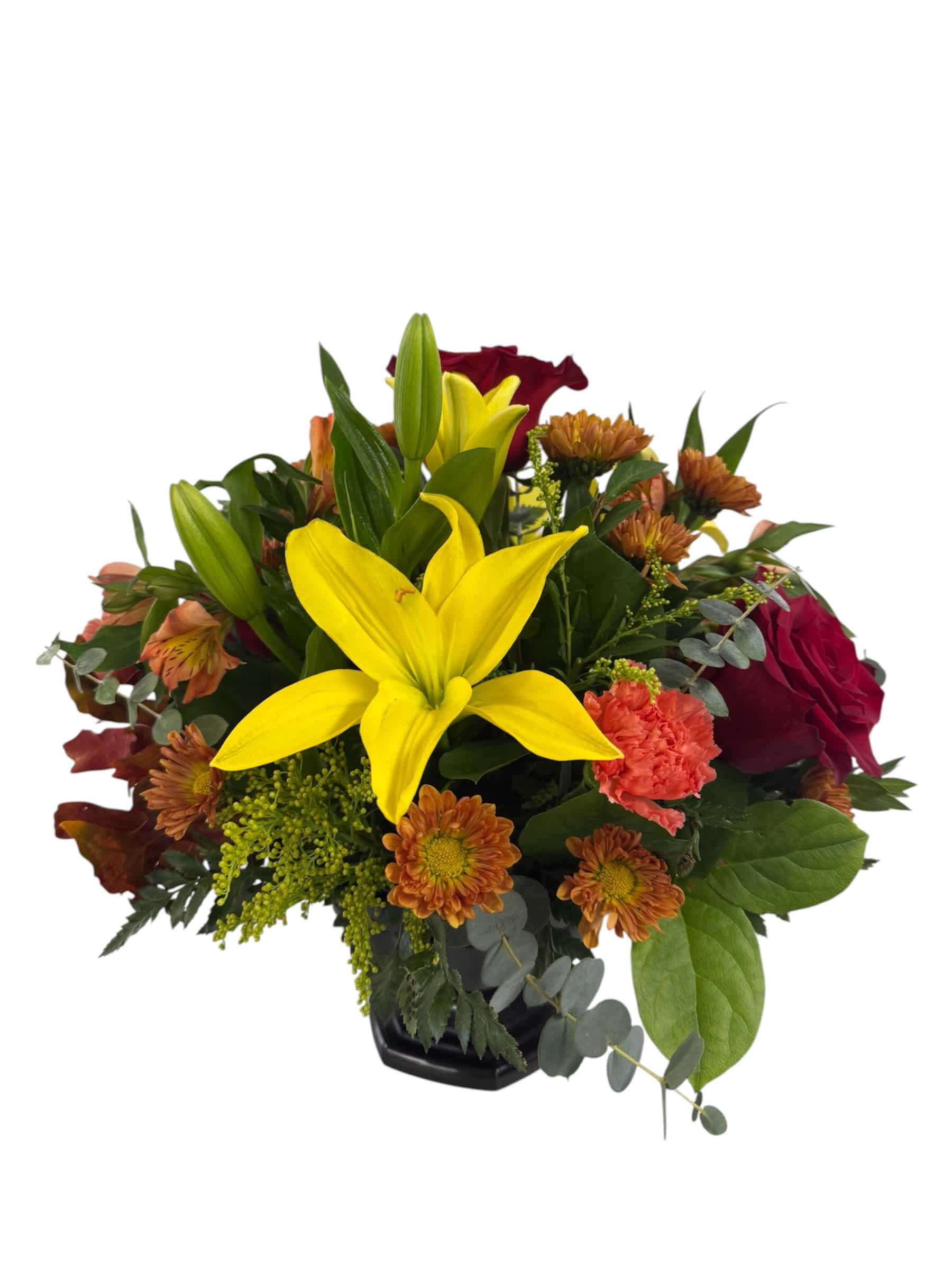 Mixed bouquet with yellow lilies, red roses, and orange mums in a black vase